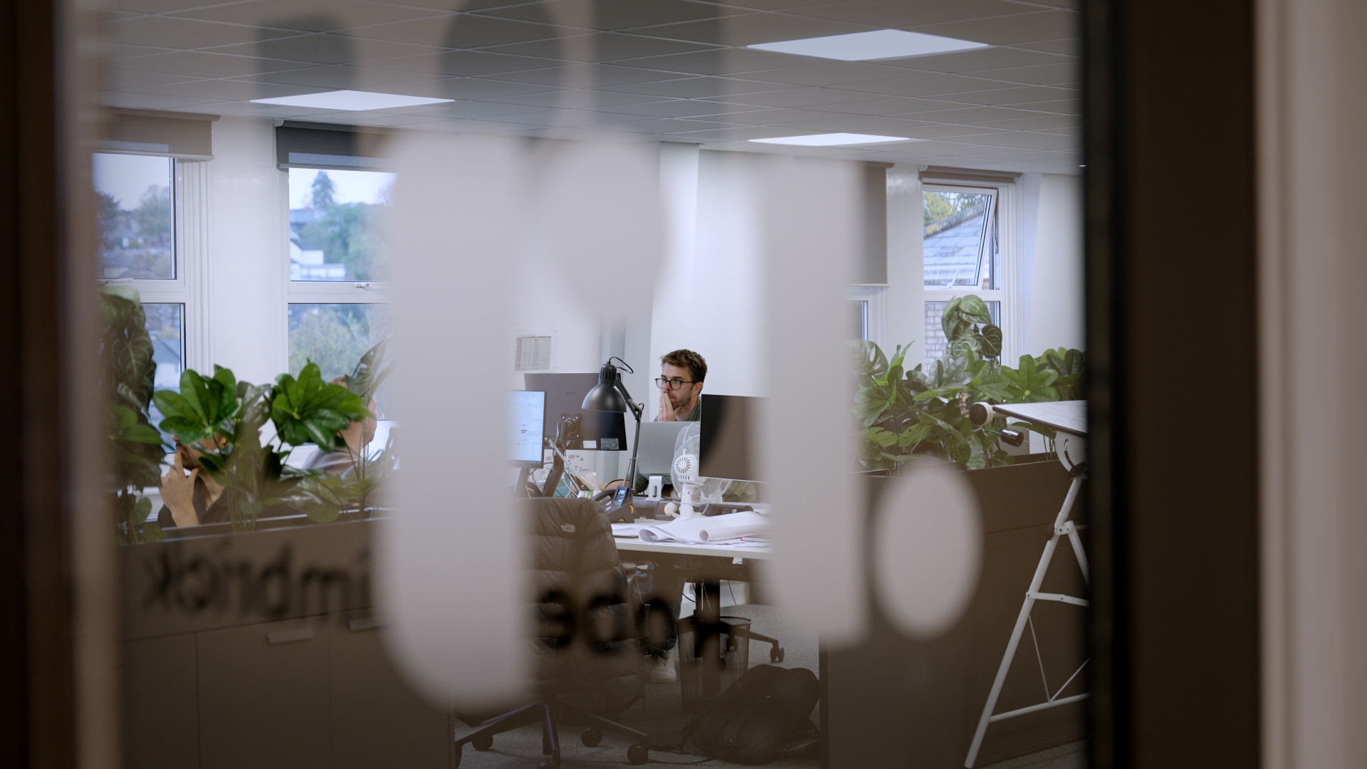 Roberts Limbrick office seen through branded glass signage